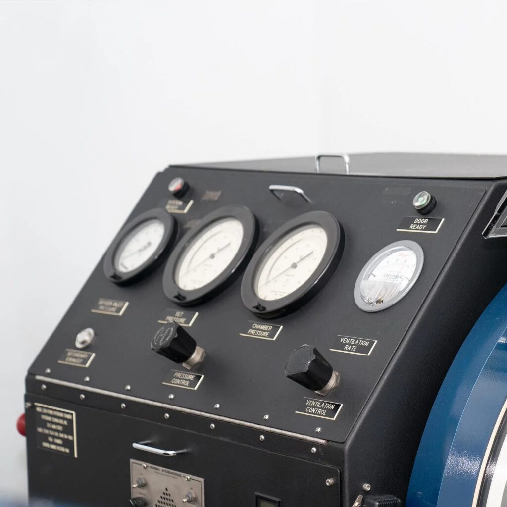 Close view of the Bella Oxygen hyperbaric chamber pressure gauges and control valves